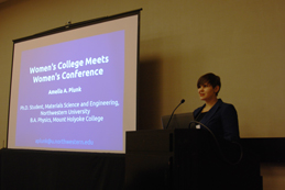 The author presenting her talk entitled "Women's College meets Women's Conference." Photo courtesy of Ariel Ekblaw